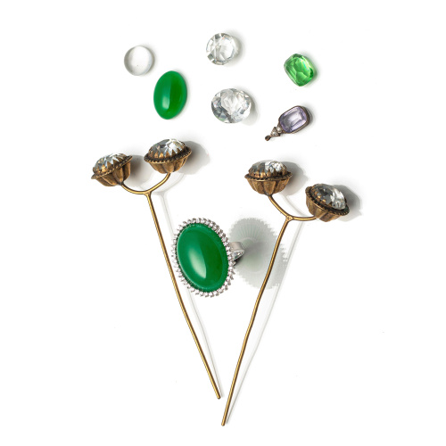 A GROUP OF STONES AND GLASS CARVINGS